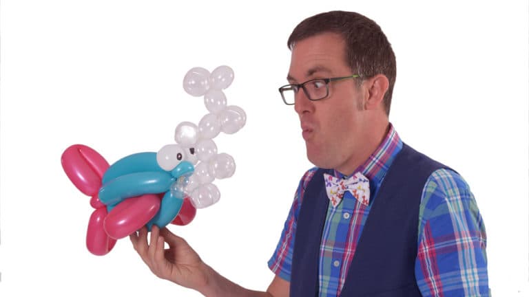 Balloon artist with sculpture